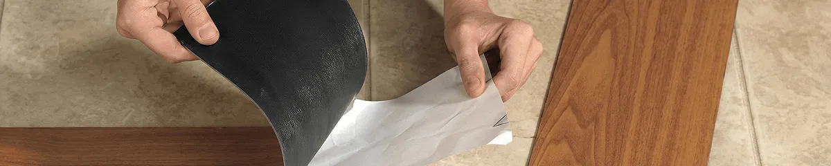 A professional installing vinyl flooring in Henderson, NV
